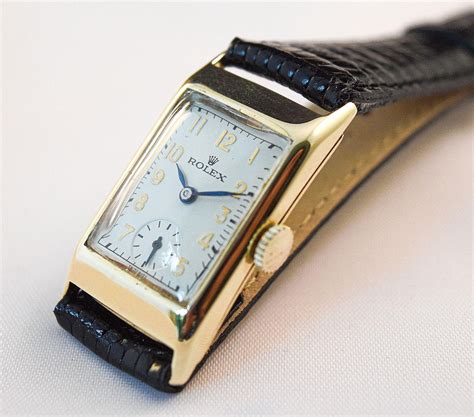 gold rolex rectangular watch vintage